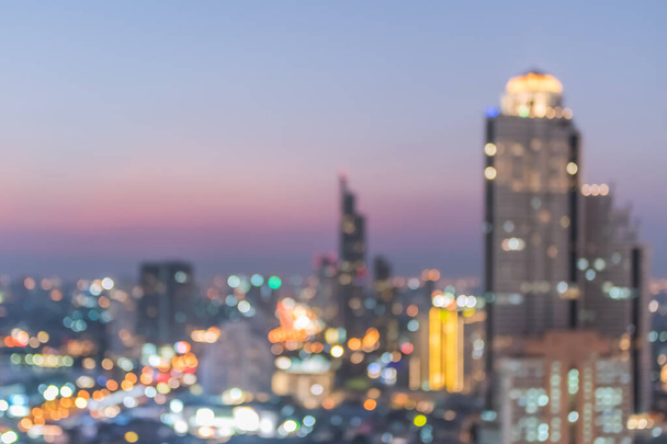 Sumentaa kaupungin tausta katto näkymä kaupunkikuva liikerakennus maisema yövalot bokeh - Valokuva, kuva