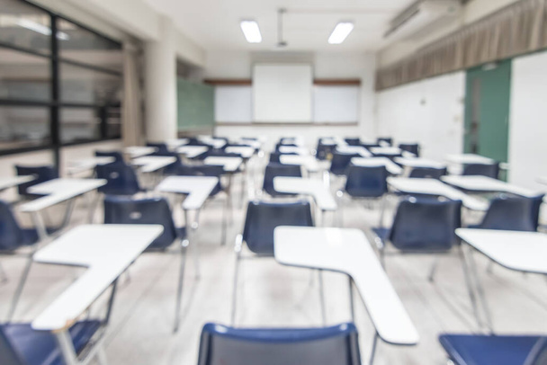 Blur classroom education background empty school class lecture room interior view with no teacher nor student - Foto, imagen