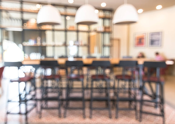 Θολή αφηρημένη άποψη φόντο άδειο τραπέζι εργασίας και καρέκλα για το χώρο εργασίας ή ομαδική συζήτηση συνάντηση στην καφετέρια - Φωτογραφία, εικόνα