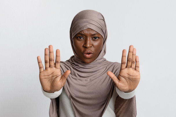 Annoyed Black Lady In Hijab Making Refuse Stop Gesture With Opened Palms - Photo, Image