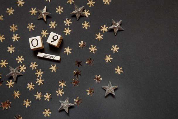 Feliz ano novo 09 de janeiro cubos brancos com números e estrelas de ouro - Foto, Imagem