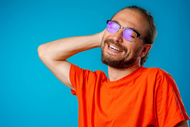 Portrait of a funny nerd man in glasses - Фото, зображення