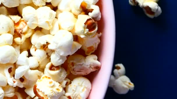  popcorn in a bowl on wooden desk - Footage, Video