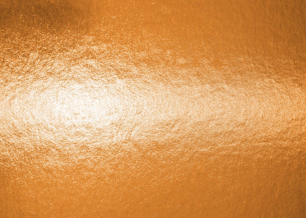Koper goud metallic wikkelfolie papier textuur glanzend oranje achtergrond voor muur papier decoratie element - Foto, afbeelding