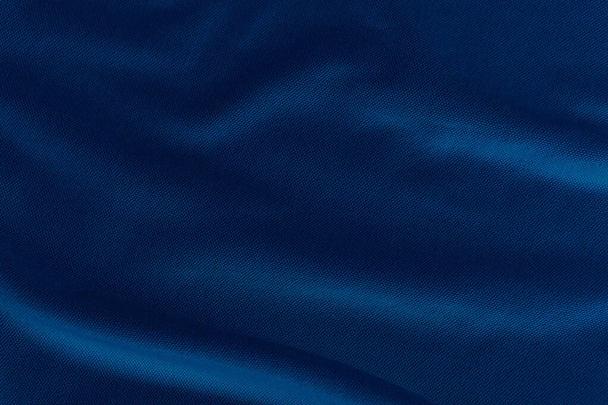 Складка синьої тканини кобальту для фону
. - Фото, зображення