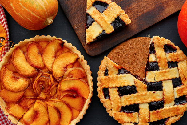 Apple pie and berry tart pie autumn composition - 写真・画像