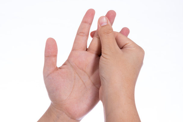 Mann Hand massiert ihre Finger isoliert weißen Hintergrund. Medizin, Gesundheitswesen für Werbekonzept. - Foto, Bild