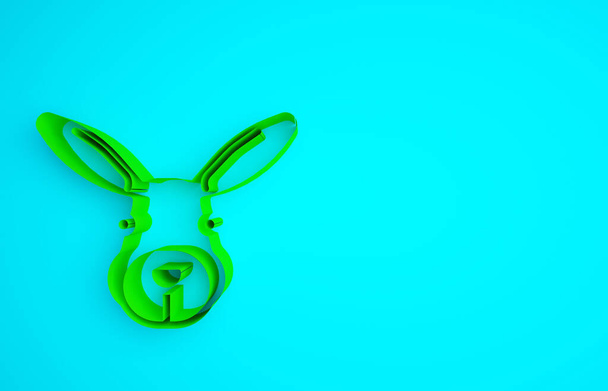 Icône tête de lapin vert isolé sur fond bleu. Concept de minimalisme. Illustration 3D rendu 3D. - Photo, image