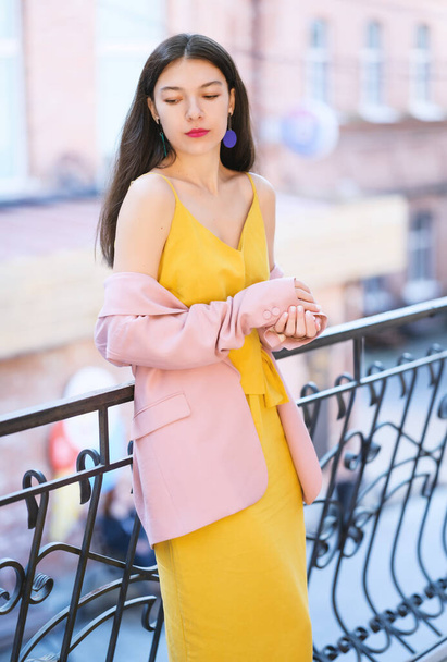 Autumn portrait of beautiful woman in yellow dress and pink blazer. - Fotografie, Obrázek