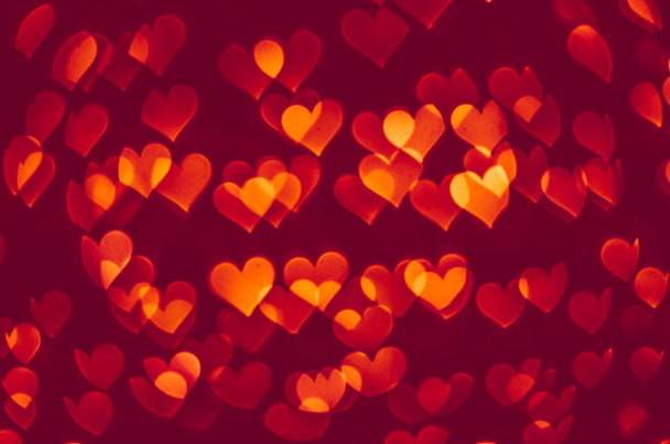 vermelho coração forma bokeh no fundo preto  - Foto, Imagem