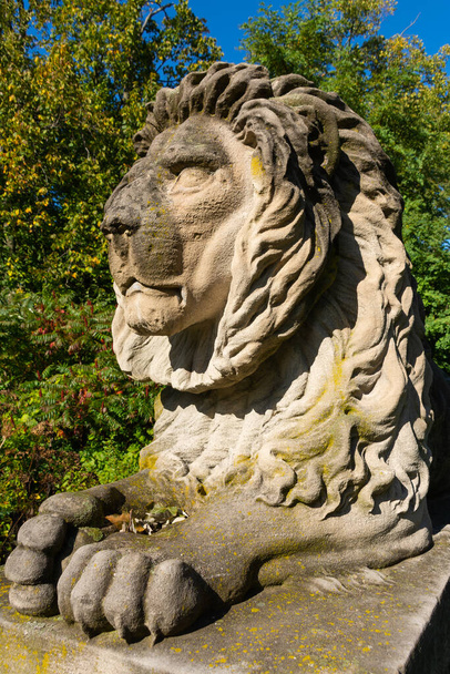 Old lion statue on a beautiful Autumn day.  Milwaukee, Wisconsin, USA - Photo, Image