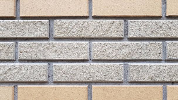 Deux types de murs rectangulaires en briques carrelées. Modèle de brique fond texturé. Fond de maçonnerie. Pierre maçonnerie mur surface gros plan - Photo, image