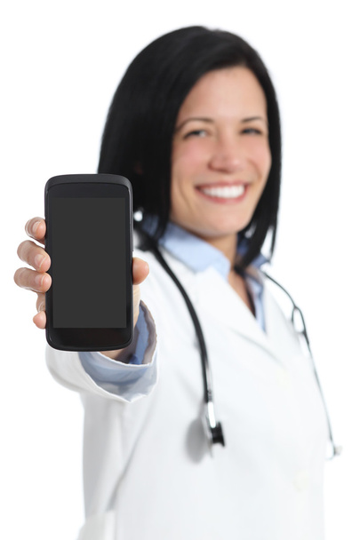 Happy doctor woman showing a blank smart phone display application - Fotó, kép