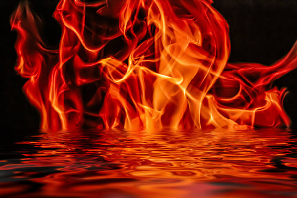 Hot fire flames in water as nature element and abstract background - Photo, Image