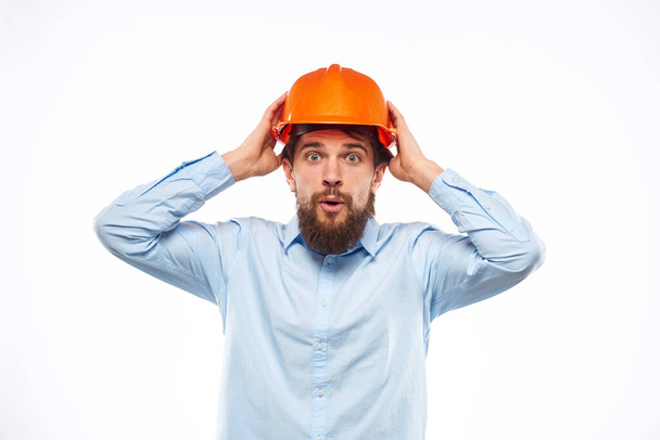 Man in working uniform orange hard hat lifestyle official - Photo, Image