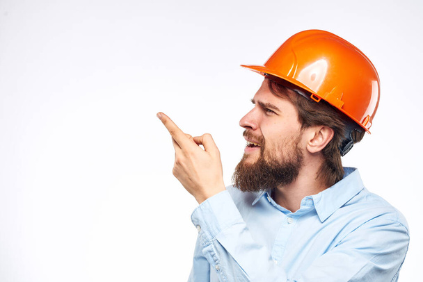 engineer in orange hard hat safety work construction industry - Photo, Image