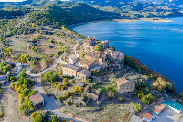Small town of La Clua in Basella Lleida, with 18 inhabitants in the Rialb Reservoir, Catalonia. Spain - Photo, Image