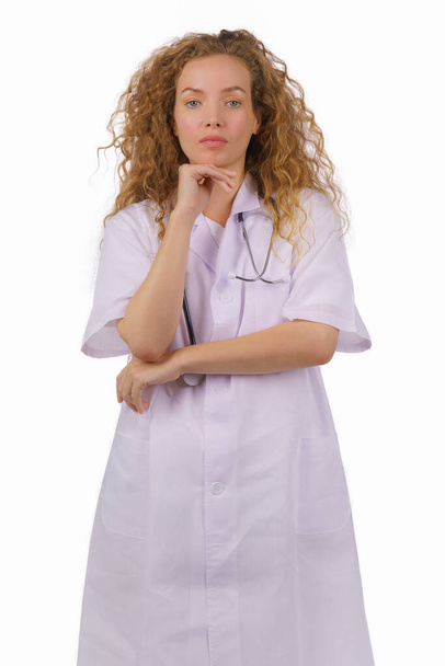 portrait of caucasian female doctor in lab coat with stethoscope isolated on white background - Фото, зображення
