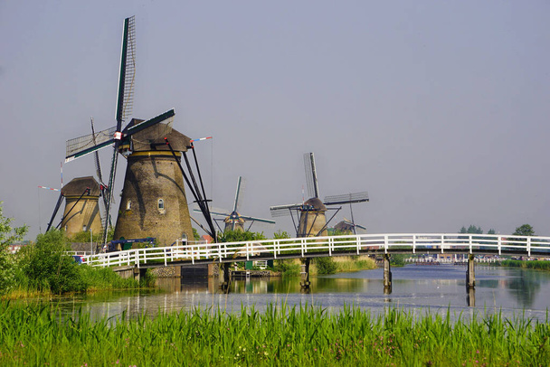 Netherlands famous landscape with windmills at Kinderdijk in Holland. Unesco world heritage. - Photo, Image