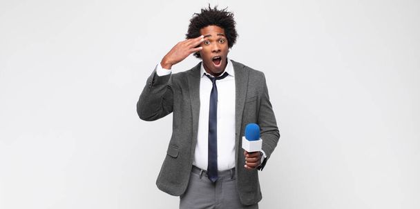 young black man as a tv presenter - Foto, imagen