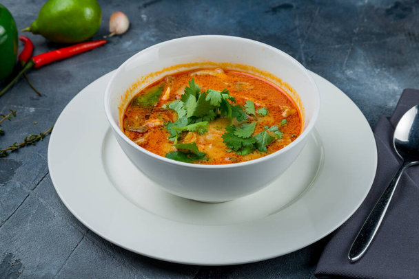 Tom Yam soup on grey table - Foto, immagini
