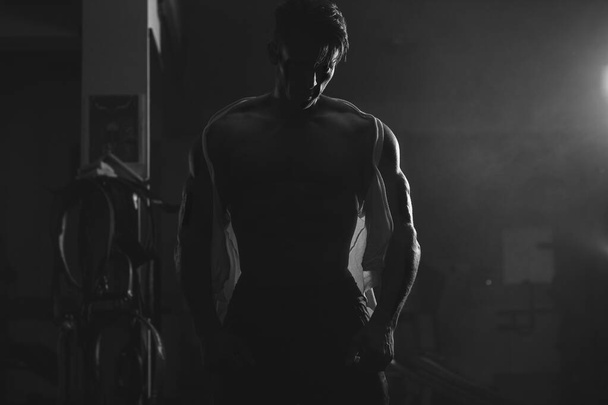 silhouette of muscular man - Fotoğraf, Görsel