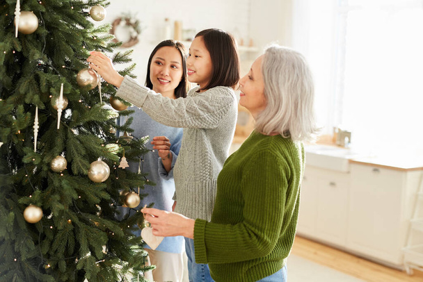Family preparing for Christmas - Фото, изображение
