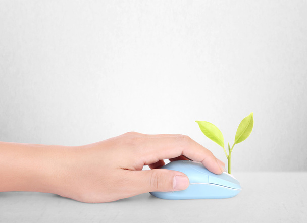 hands using  mouse with  plant - Φωτογραφία, εικόνα