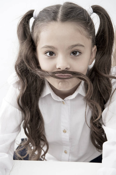 small girl with funny mustache. Small girl with long hair style - Foto, imagen