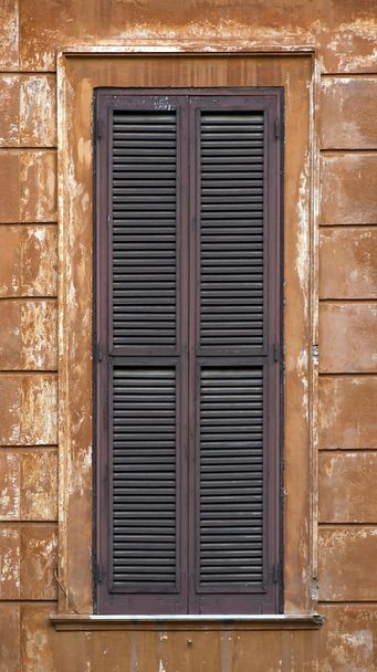 Window with dark magenta shutters - Photo, Image