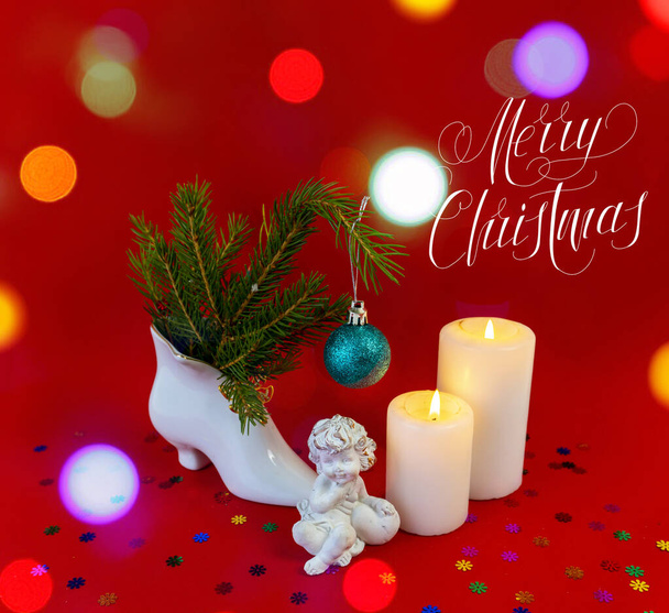Christmas card, banner, flatlay with text - Merry Christmas on a red background. bokeh effect - Photo, Image