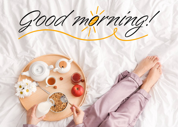 Woman having tasty breakfast in bed, top view - Foto, immagini