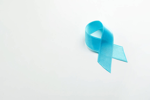 Blue ribbon on white background. Prostate cancer awareness concept - Foto, Bild