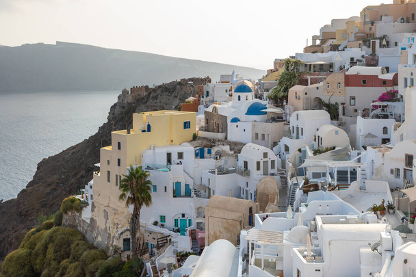 Oia, Santorini Island, Greece- 18 September 2020: Scenic view of famous, traditional cycladic white architecture in the village. - Valokuva, kuva