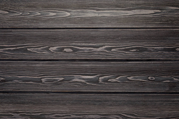 Textured wood surface. Natural background from larch boards. Dark color.  - Foto, Imagen