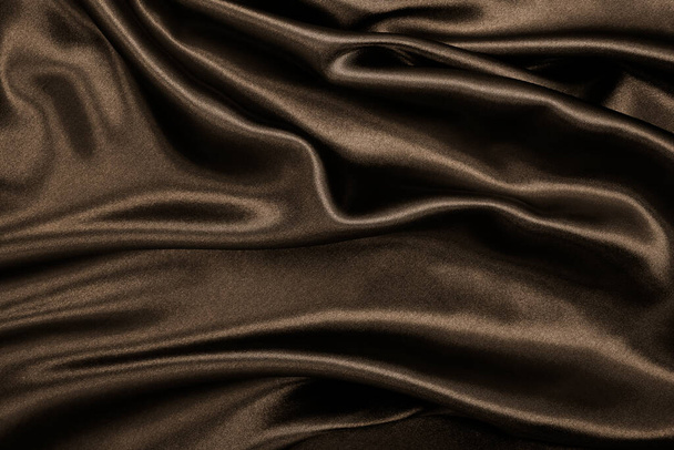 Smooth elegant brown silk or satin texture can use as abstract background. Luxurious background design. In Sepia toned. Retro style - Foto, afbeelding