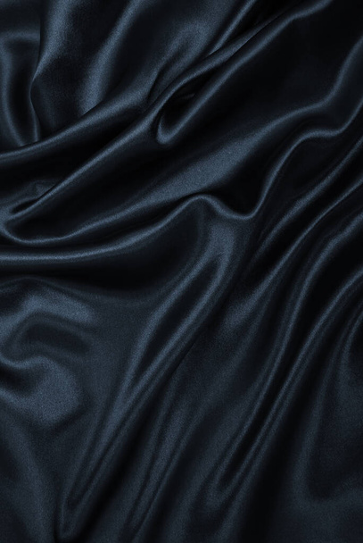 Smooth elegant dark grey silk or satin texture can use as abstract background. Luxurious background design - Foto, imagen