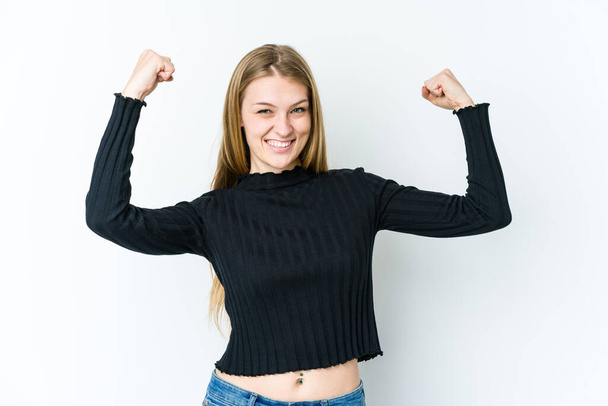 Young blonde woman isolated on white background cheering carefree and excited. Victory concept. - Photo, Image
