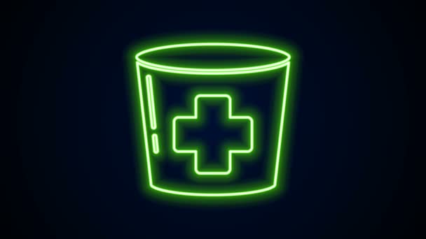 Glowing neon line Nurse hat with cross icon isolated on black background. Medical nurse cap sign. 4K Video motion graphic animation - Footage, Video
