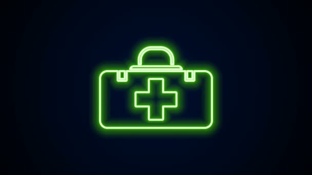 Glowing neon line First aid kit icon isolated on black background. Medical box with cross. Medical equipment for emergency. Healthcare concept. 4K Video motion graphic animation - Footage, Video