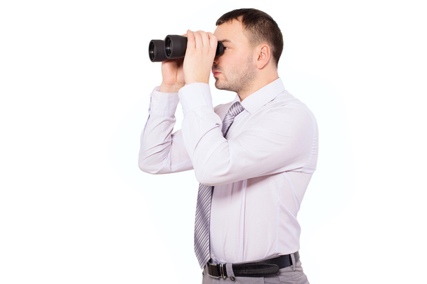 Businessman with binoculars in hand. - Foto, imagen