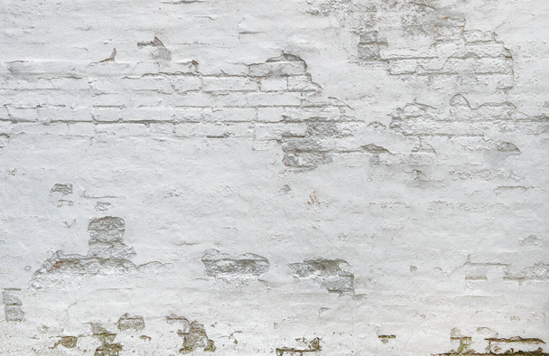 White brick wall background. Weathered plaster texture - Fotoğraf, Görsel