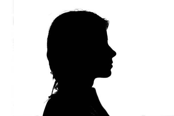 silhouette of a girl on a white background - Foto, imagen