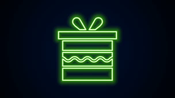 Ragyogó neon vonal Ajándék doboz ikon elszigetelt fekete háttér. Boldog szülinapot! 4K Videó mozgás grafikus animáció - Felvétel, videó