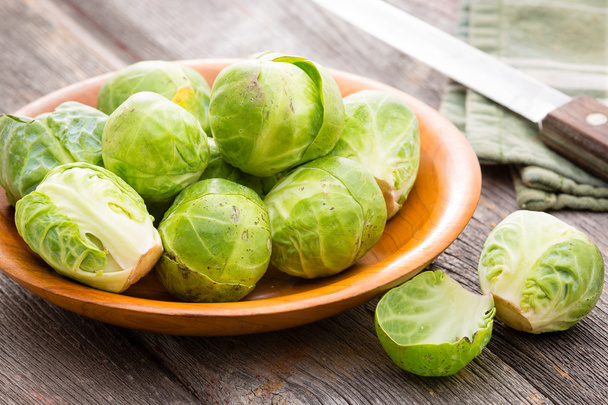 Bowl of fresh uncooked brussels sprouts - Foto, Imagem