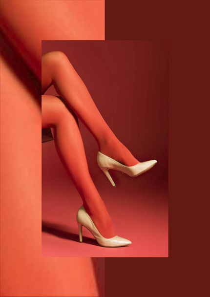 Background. Feet of a woman in white shoes. - Foto, afbeelding