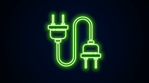 Linea neon incandescente icona della spina elettrica isolata su sfondo nero. Concetto di connessione e disconnessione dell'elettricità. Animazione grafica 4K Video motion - Filmati, video