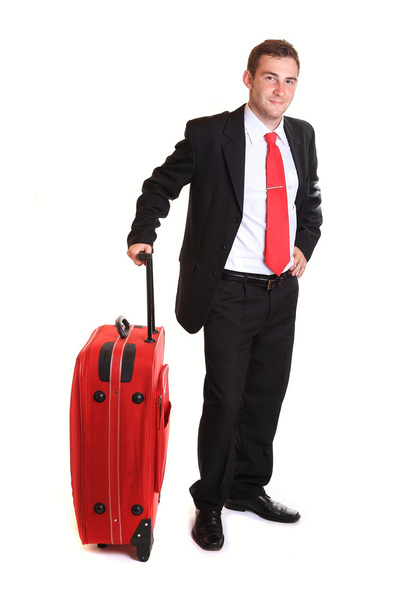Businessman with suitcase against white background - Фото, изображение
