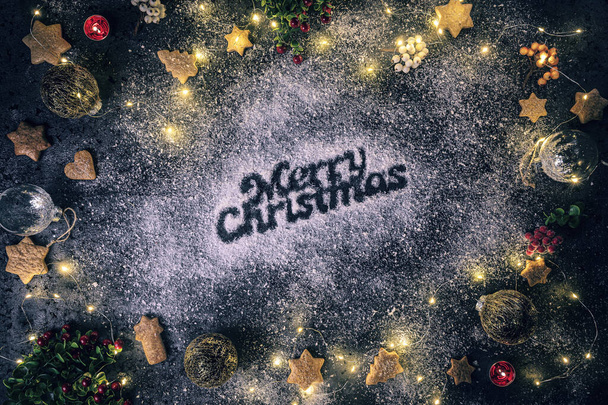 Merry Christmas text in snow - Фото, изображение