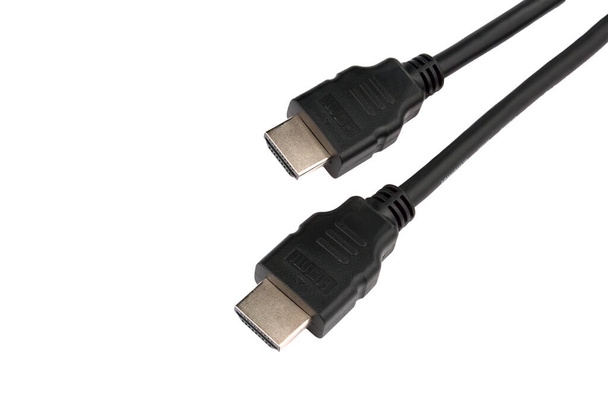 HDMI Kabel geïsoleerd op witte achtergrond. HDMI-kabelaansluiting. - Foto, afbeelding